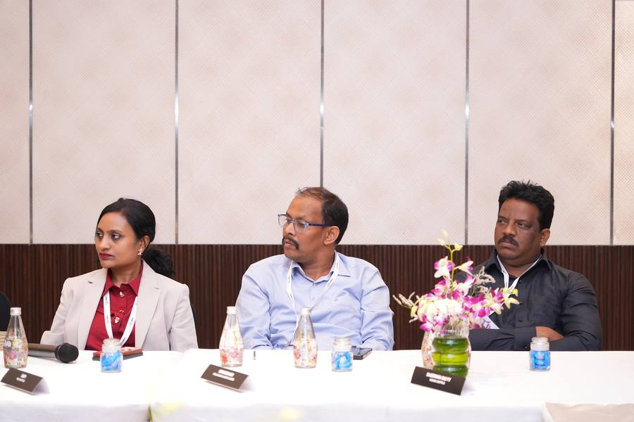 Guests following the discussion at the table