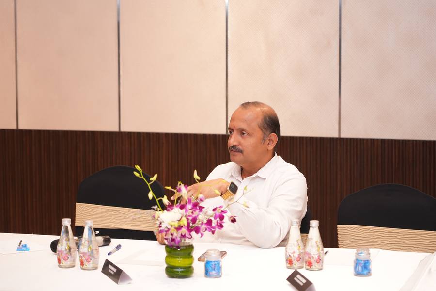 A hospital leader listening to the discussion