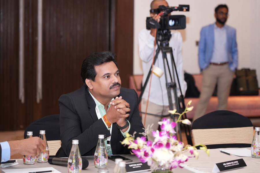 A guest listening during the discussion